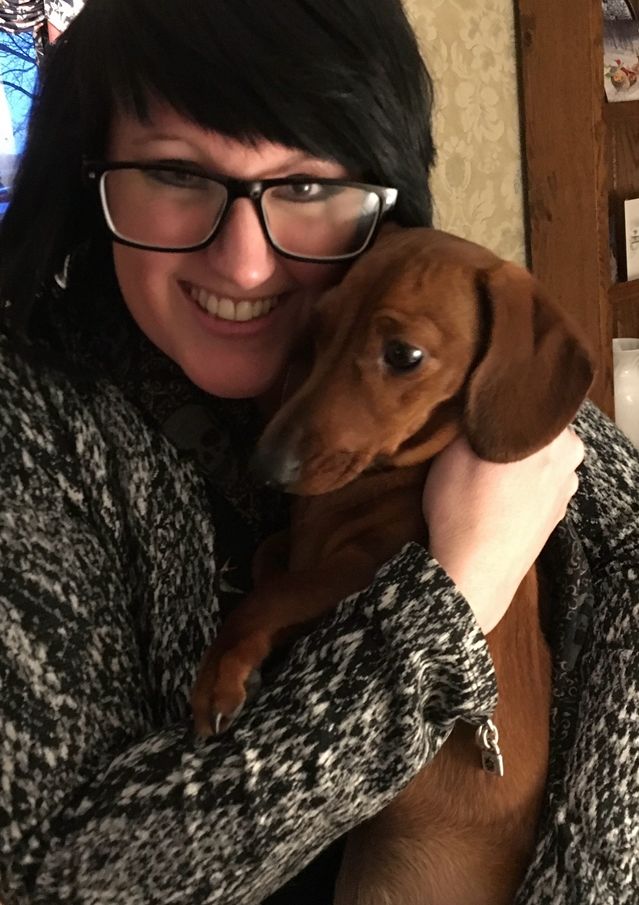 Pixie Greatorex, freelance pet blog writer with a sausage dog